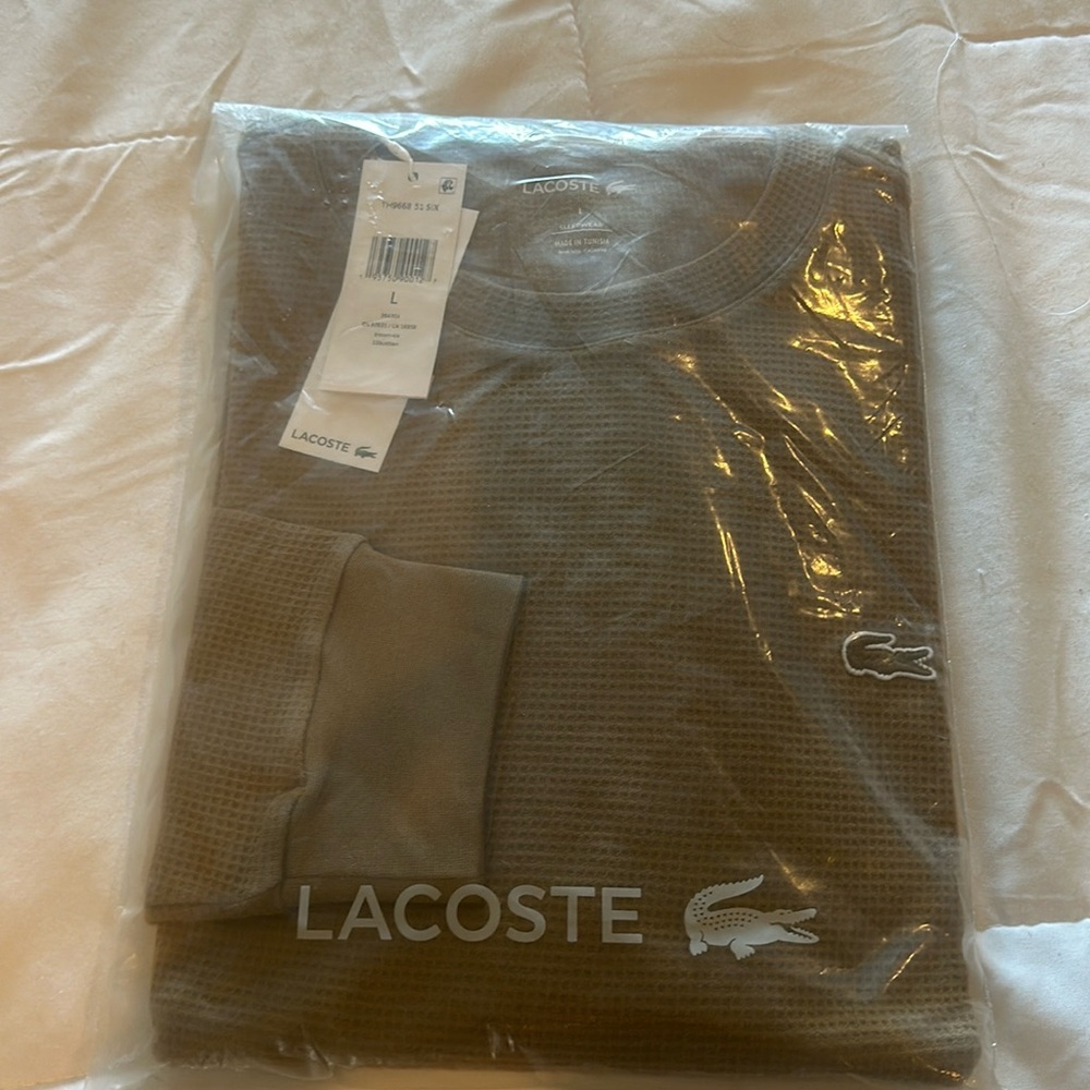 Lacoste Shirt, size large, never been worn, tan